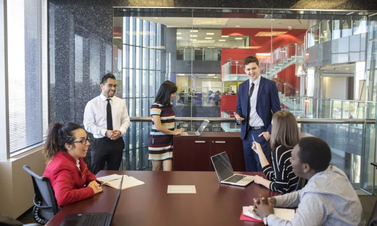 Seneca College Students in a room talking